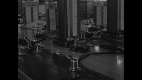 PANAMA - 1953: Lock Control Room - A close dial anchors the console Stock Footage 344002194