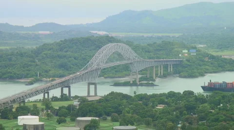 Panama Canal: Ship passes under Bridge of the Americas - timelapse Stock Footage 1048708
