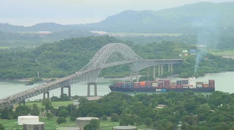 Panama Canal: Ship passes under Bridge of the Americas Stock Footage 1049101