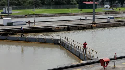 Panama Canal Workers Walk on Locks Stock Footage 9277990