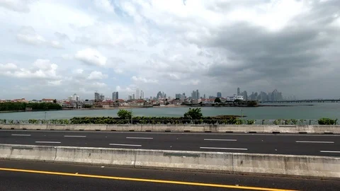Panama driving over the Cinta Costera viaduct view of the old and new town Stock Footage 125000837