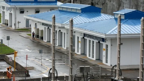 Panamanian worker standing in front of  the Machine Building. Stock-Footage 121458176