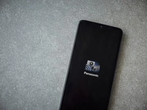 Panasonic Image App app launch screen with logo on the display of a black mob Stock Photos