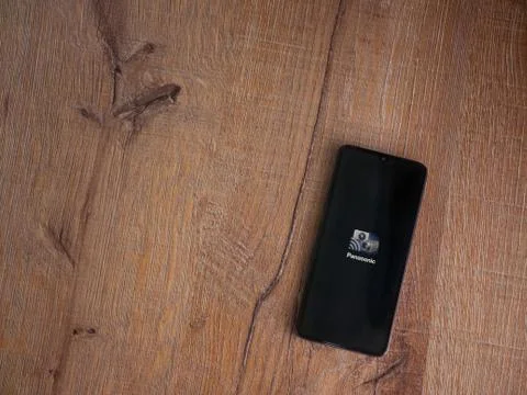 Panasonic Image App app launch screen with logo on the display of a black mob Stock Photos