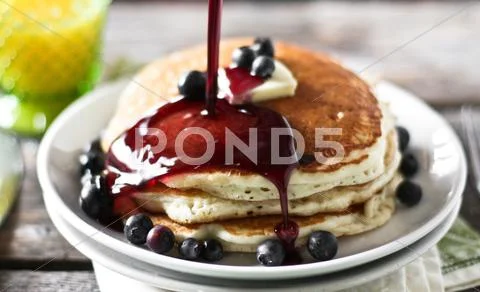 Pancake and syrup Stock Photos