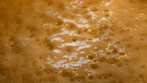 Pancake batter is being baked Stock Footage 256038706
