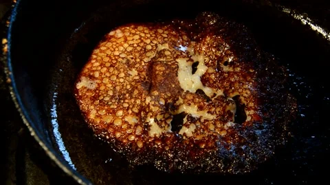 Pancake is being baked Stock Footage 256038361