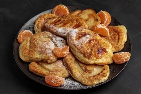 Pancake breakfast. Delicious stack mandarin, apple Stock Photos