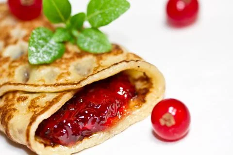 Pancake with currants Stock Photos