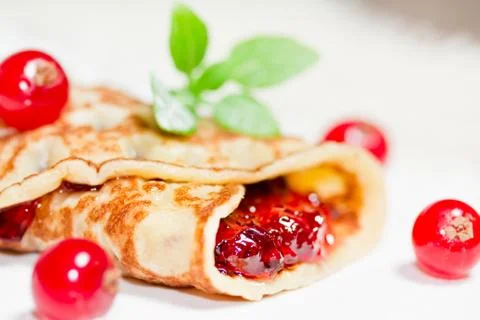 Pancake with currants Stock Photos