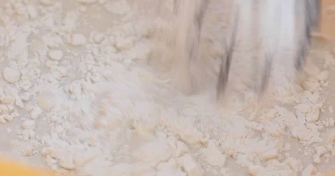 Pancake dough preparing, pouring flour and mixing, close-up Stock Footage 104908145
