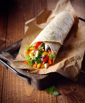 Pancake filled with feta and vegetables Stock Photos