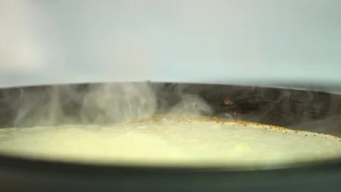 The pancake is fried in a frying pan Stock Footage 85950762