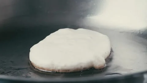Pancake fried in a pan Video stock 131154353