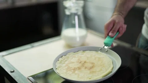 Pancake in a frying pan Stock Footage 79117131