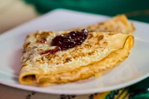 Pancake with jam Stock Photos