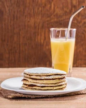 Pancake with orange juice Stock Photos