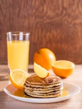Pancake with orange juice Stock Photos
