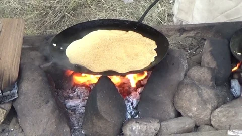 Pancake pan cooking fire Video stock 80959350