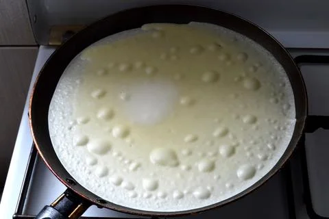 Pancake in the pan Stock Photos