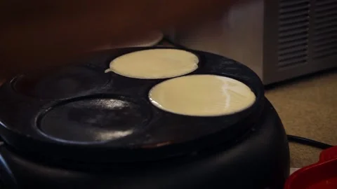 Pancake preparation. Breakfast time. Cooking equipment. Male hands cooking Stock Footage 153376557