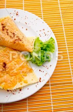 Pancake with pumpkin in plate Stock Photos
