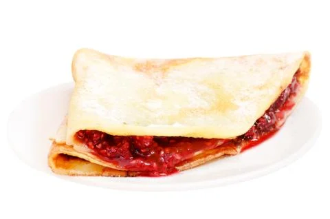Pancake with raspberry jam on a plate Stock Photos