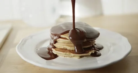 Pancake with slow motion chocolate Stock Footage 238383710
