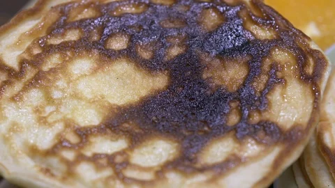 Pancake sprinkled with chocolate topping Stock-Footage 88041806