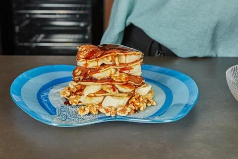 Pancake stack with syrup and bananas Stock Photos