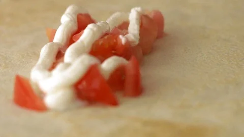 Pancake stuffed with tomato, pepper and pickled cucumber with sauce is ready to Stock Footage 94124531
