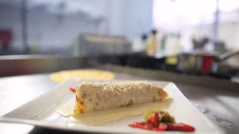 Pancake stuffed with vegetables, Vegetable crepe with parmesan cheese Stock Footage 83644759