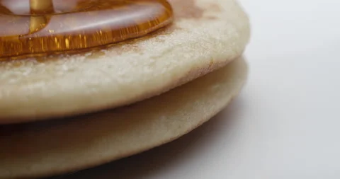 Pancakes and maple syrup macro slow motion 4K Stock Footage 148962471
