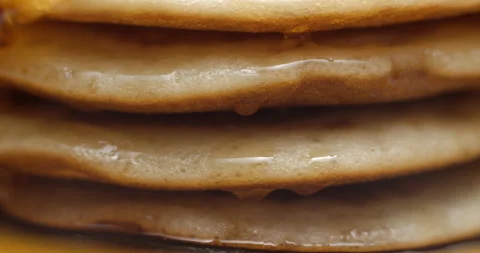 Pancakes and maple syrup macro slow motion 4K Stock Footage 149008830