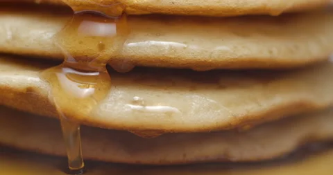 Pancakes and maple syrup macro slow motion 4K Stock Footage 149008988