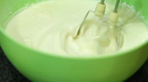 Pancakes being made on pan in the kitchen. HD from 4 clips. Stock Footage 637436