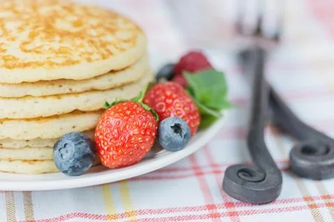 Pancakes with berries Stock Photos