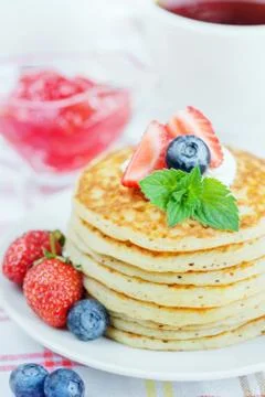 Pancakes with berries Stock Photos
