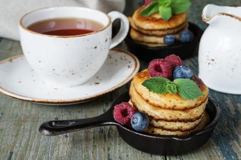 Pancakes with berries Stock Photos