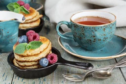 Pancakes with berries Stock Photos