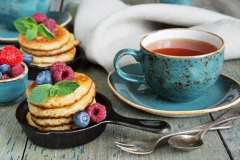 Pancakes with berries Stock Photos