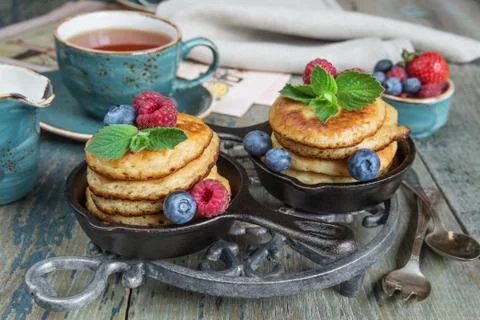 Pancakes with berries Stock Photos