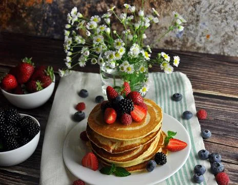 Pancakes with berries Stock Photos