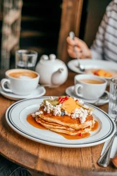 Pancakes breakfast in cafe Stock Photos