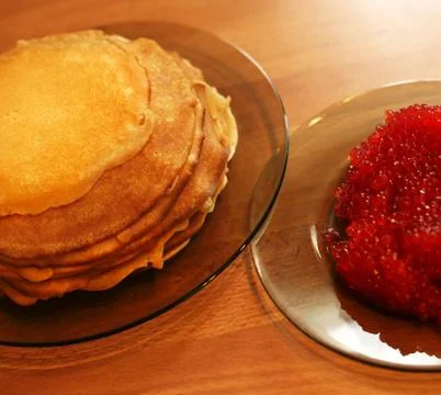 Pancakes with caviar Stock Photos