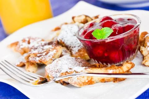 Pancakes with cherries Stock Photos