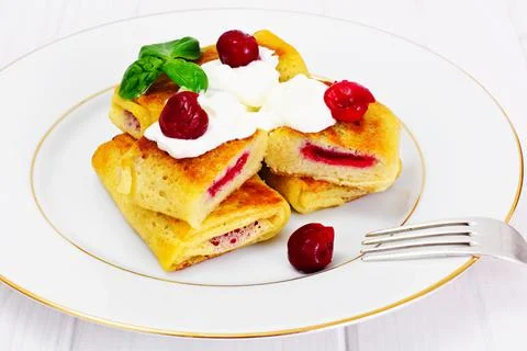 Pancakes with Cherries Stock Photos