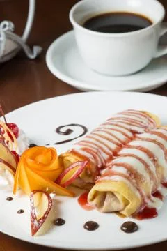 Pancakes with cherry jam Stock Photos