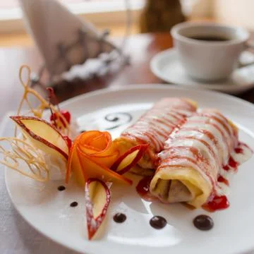 Pancakes with cherry jam Stock Photos