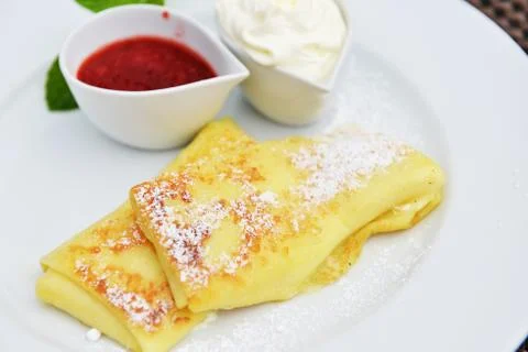 Pancakes on dish Stock Photos